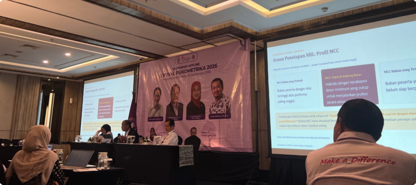Suasana sesi workshop Festival Psikometrika 2026 dengan panel pembicara dan layar presentasi